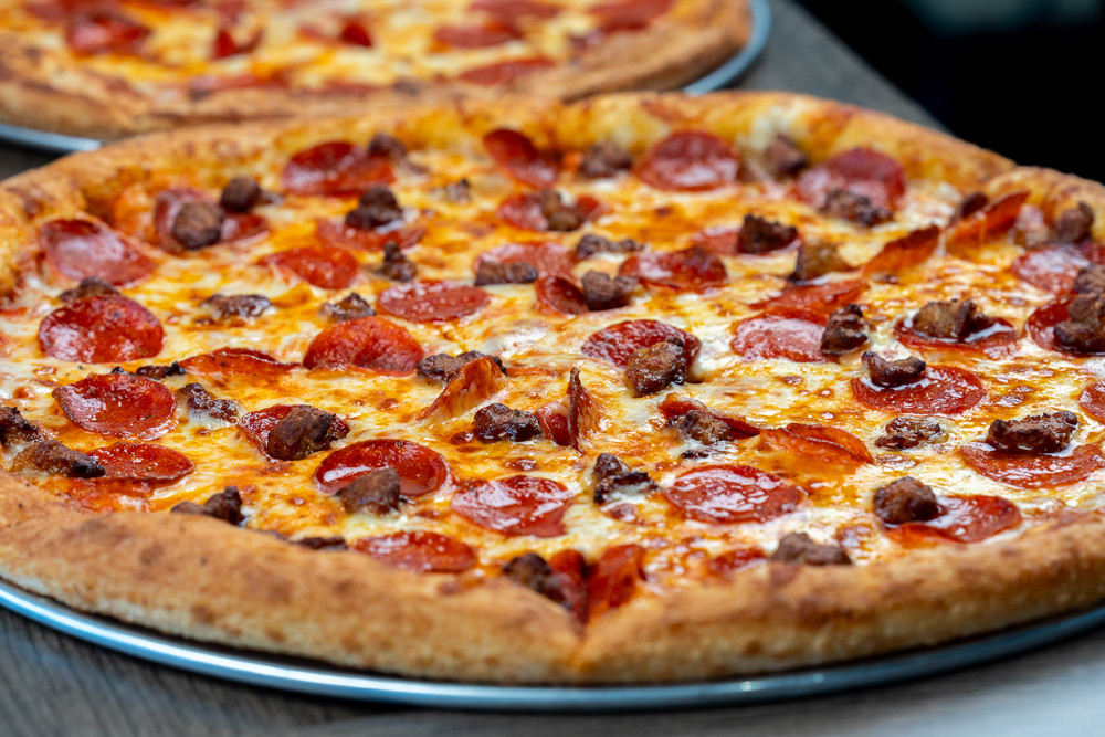 A pepperoni and sausage pizza